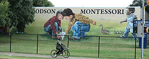 A wide view of the mural visible from I-45 at Dodson ES