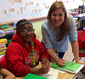 Erin Krafft with one of her students
