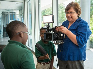 Senior producer/director Debbie Sanchez-Treese works with students from Foerster ES