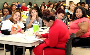 HISD employees learn about assertive communication during the fourth annual Administrative Support Professioanls Summit at the Ryan Professional Development Center on Wednesday, April 29, 2015.