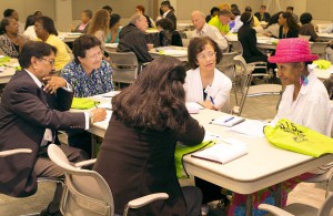 Associate Teachers discuss classroom management techniques during the inaugural Associate Teacher Summit on June 8.
