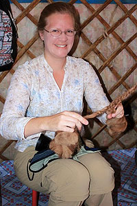 Shana Steinhardt learns how to make a rope made out of camel hair inside a ger.